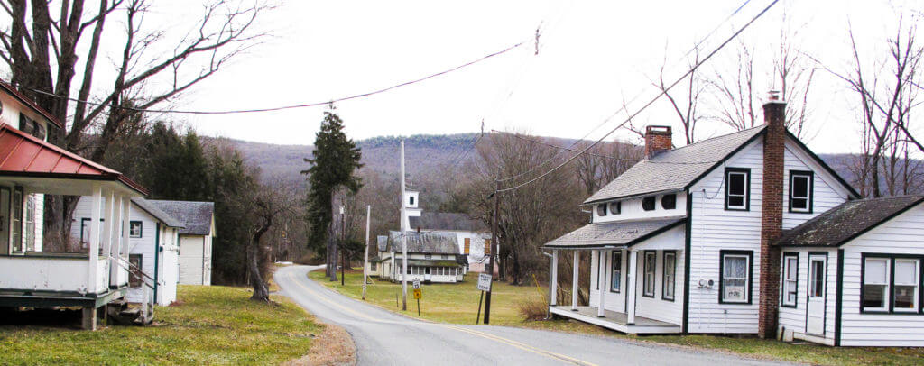 A ghost town with whitewashed buildings