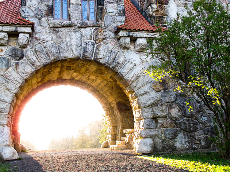 Sunrise through the stone gate -- the Testimonial Gate -- in Mohonk Preserve in New Paltz, New York.